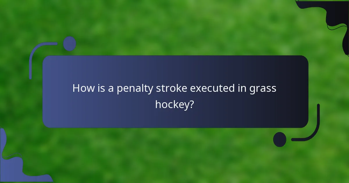 How is a penalty stroke executed in grass hockey?