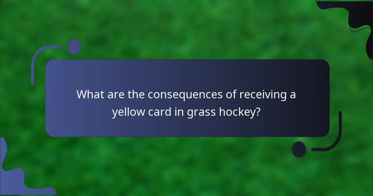 What are the consequences of receiving a yellow card in grass hockey?